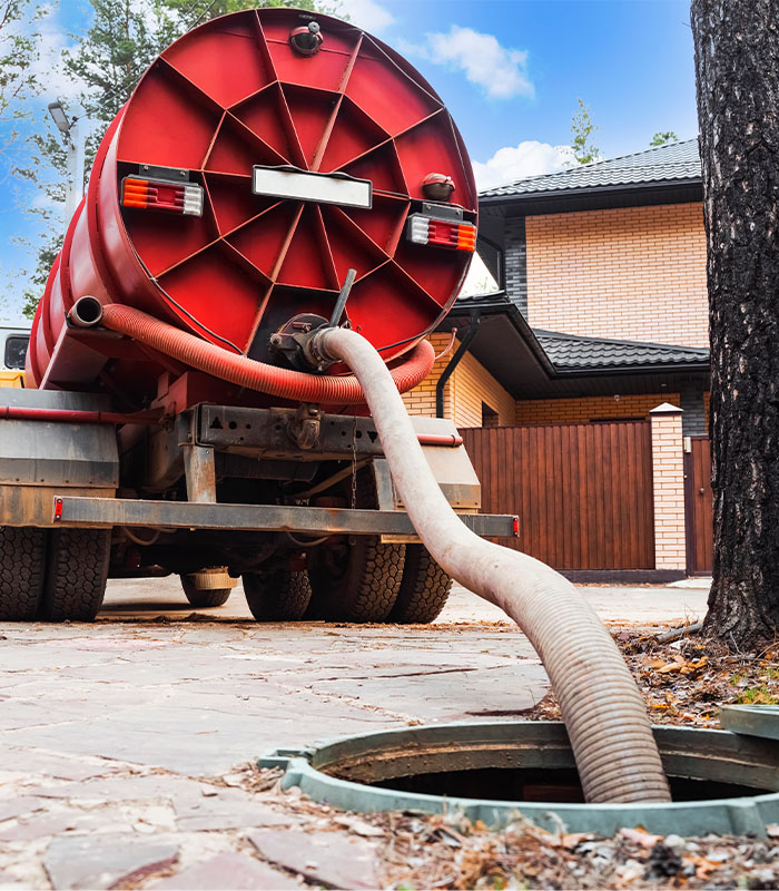 Pumping out sewage from a septic tank